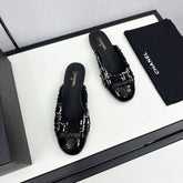 BOW MULE IN BLACK MIX WHITE FUR AND CALFSKIN